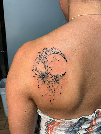 Find beach scene tattoo ideas for your next unique tattoo in Okeechobee at Muck City Tattoos & Piercings