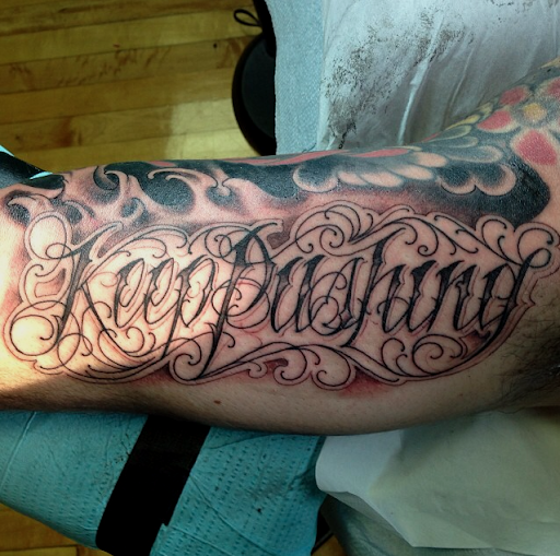 Explore faith based tattoo ideas, creative tattoo ideas in Albany, available at Dead Presidents Lounge