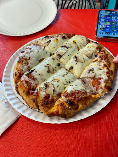 #5 best pizza place in Michigan City - Mama C’s Pizzeria