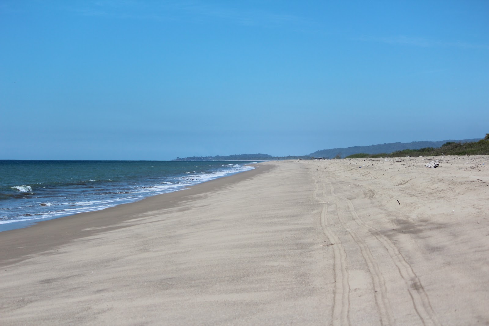 Zdjęcie Chila beach II z powierzchnią beżowy piasek