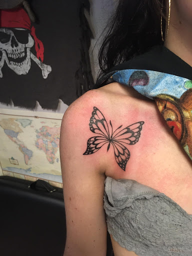 Explore under chin tattoo ideas, creative tattoo ideas in Jonesboro, available at Immortal Ink