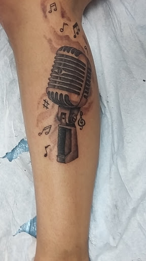 Explore first child tattoo ideas for dad, creative tattoo ideas in Madison, available at Blue Lotus Tattoo & The Piercing Lounge