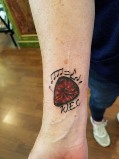 Explore tattoo ideas skull and roses, creative tattoo ideas in San Diego, available at Bearcat Tattoo Gallery