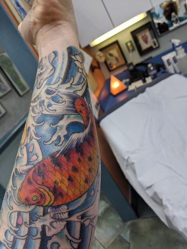 Explore pizza tattoo ideas, creative tattoo ideas in Glen Burnie, available at Dragon Moon Tattoo Studio Inc