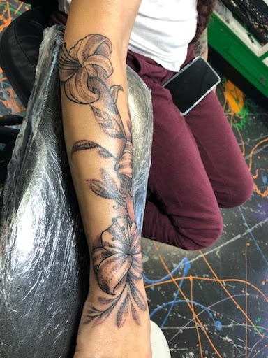 Explore arm tattoos for women ideas, creative tattoo ideas in Redding, available at Caddy Daddys