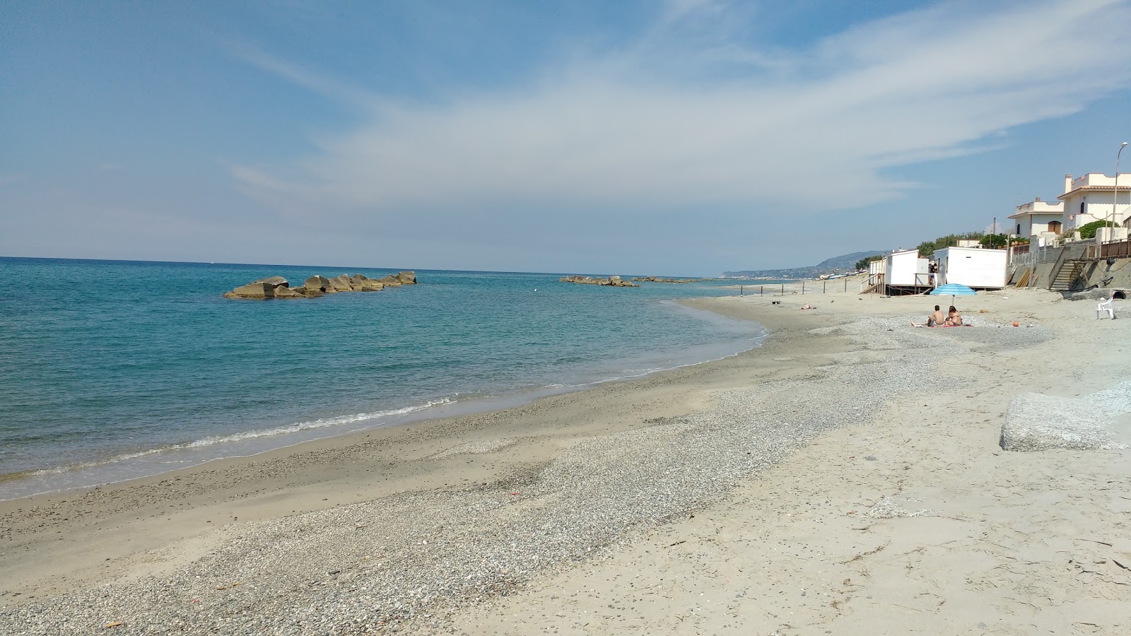 Valokuva Rometta Marea beachista. puhtaustasolla matala