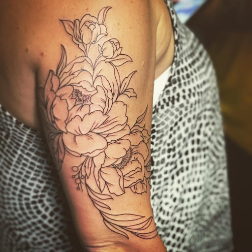 Explore disney thigh tattoo ideas, creative tattoo ideas in Bloomfield, available at Tattoo Garage