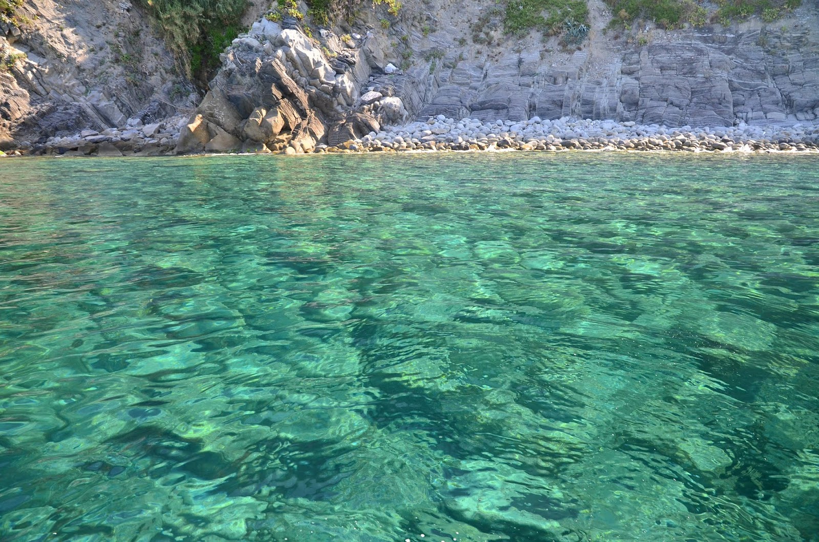 Valokuva Spiaggia del Naccheista. puhtaustasolla matala