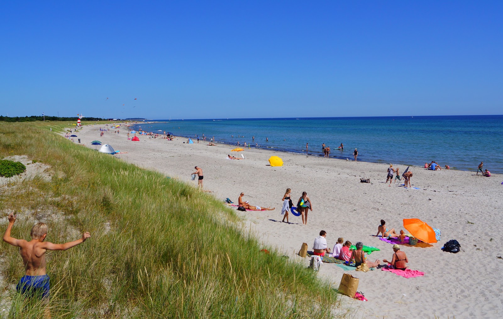 Grenaa Beach的照片 带有明亮的沙子表面