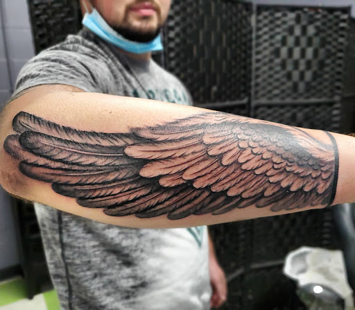 Explore lion sleeve tattoo ideas, creative tattoo ideas in Lake, available at Soul Rebel Tattoo