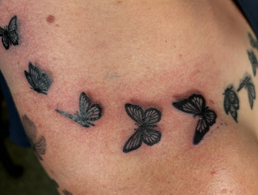 Explore dog ears tattoo ideas, creative tattoo ideas in Belgrade, available at The Loyal Sparrow Tattoo and Piercing