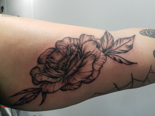 Explore cross tattoo idea, creative tattoo ideas in Yorktown, available at Army Navy Tattoo