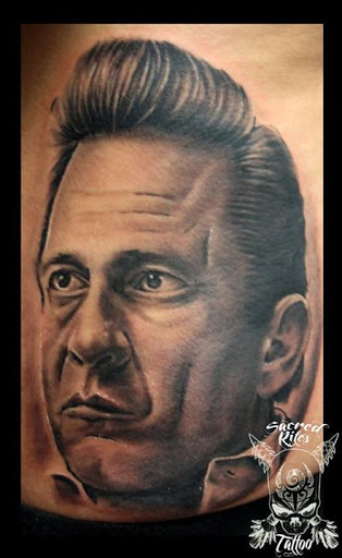 Explore dog tag tattoo ideas, creative tattoo ideas in Bradenton, available at Sacred Arts Tattoo Bradenton