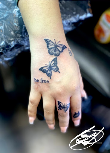 Explore women's wrist tattoo ideas, creative tattoo ideas in Douglasville, available at Long Island Ink Tattoo & Piercing