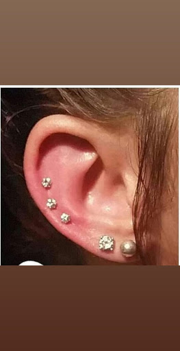 Explore solid black tattoo ideas, creative tattoo ideas in Hialeah, available at Allstar Tattoo & Body piercing