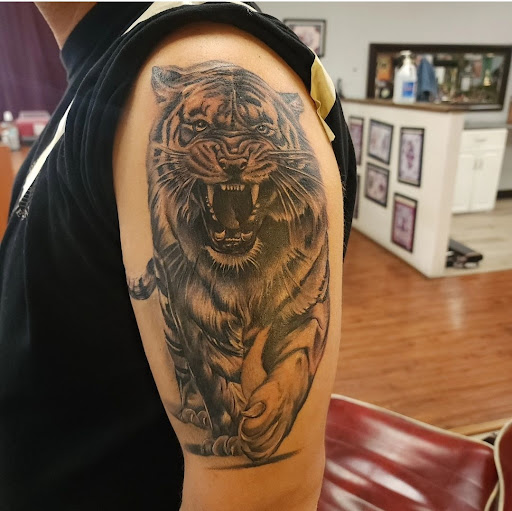 Explore american traditional elbow tattoo ideas, creative tattoo ideas in Upland, available at Mint Condition Tattoo & Body Piercing Upland, Ca