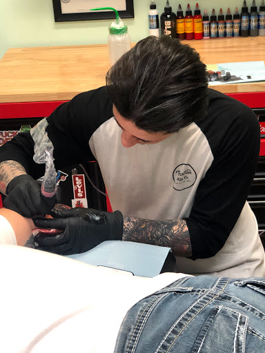 Explore foot and ankle tattoo ideas, creative tattoo ideas in Kenosha, available at Kenosha Tattoo Company