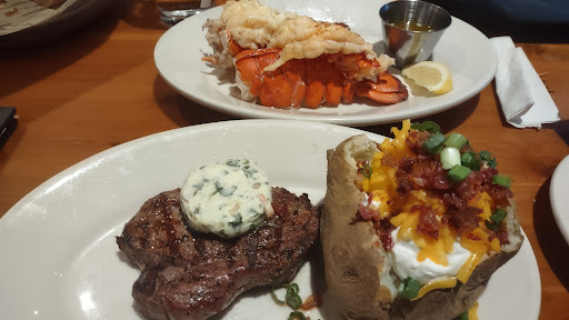 Twin lobster tails and steak.