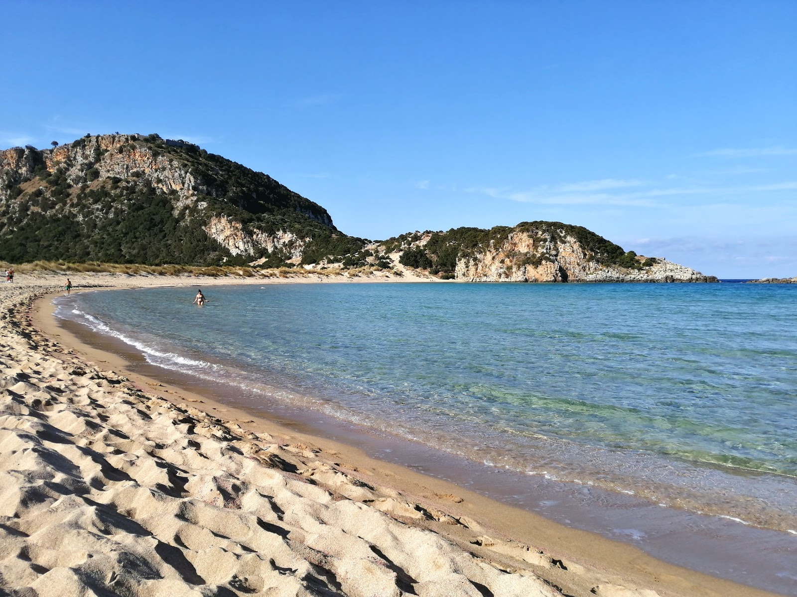 Fotografie cu Plaja Voidokilia cu o suprafață de nisip fin strălucitor