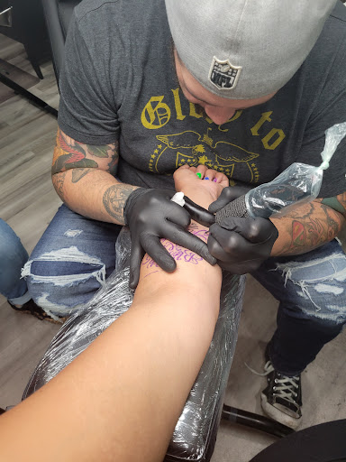 Explore hamilton tattoo ideas, creative tattoo ideas in Toledo, available at Ink and Iron Tattoo Parlour and Gallery