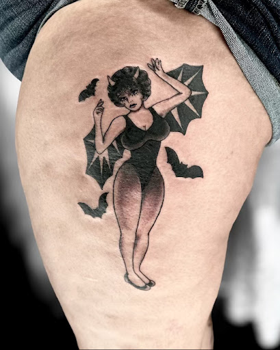 Explore hand tattoo ideas for men, creative tattoo ideas in Marietta, available at The Queen Bee Tattoo and Piercing Parlour