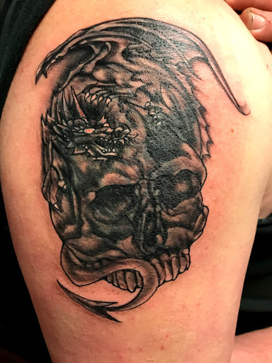 Explore camo tattoo ideas, creative tattoo ideas in Seymour, available at American Gypsy Tattoo Corp.