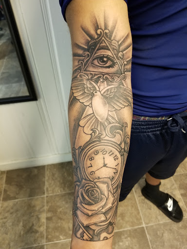 Explore last name tattoo ideas male, creative tattoo ideas in Albany, available at Tat Jones Ruthless Tattoos L.L.C.