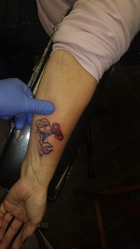 Explore single flower tattoo ideas, creative tattoo ideas in Casper, available at Final Thoughts