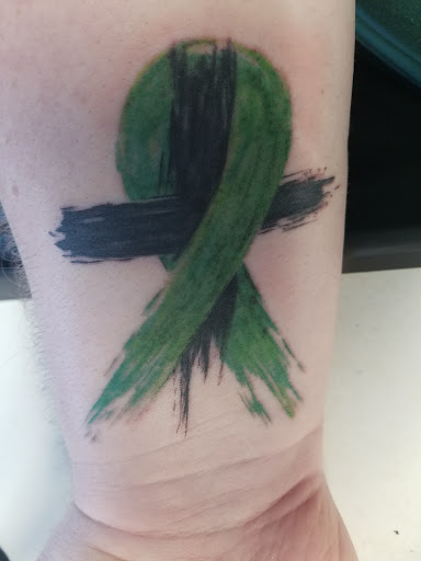 Explore half sleeve tattoo idea, creative tattoo ideas in Greenfield, available at Garden of Eden Tattoos