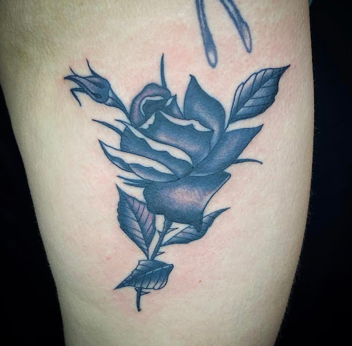 Explore stained glass tattoo ideas, creative tattoo ideas in Denton, available at Black Anchor Tattoo