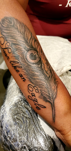 Explore bald eagle tattoo ideas, creative tattoo ideas in Jamaica, available at Shimmy Fingers Ink Tattoos