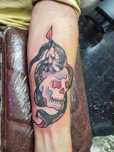 Explore back tattoo ideas men, creative tattoo ideas in Newport, available at Mutiny Tattoo Co. LLC