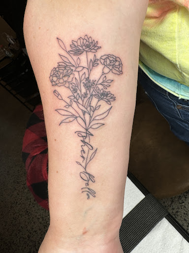 Explore open book tattoo ideas, creative tattoo ideas in Broxton, available at Seratonin Tattoo Parlor