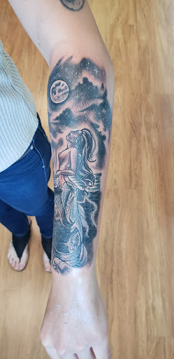 Explore scarlet witch tattoo ideas, creative tattoo ideas in Fernley, available at Speakeasy Tattoo Co.