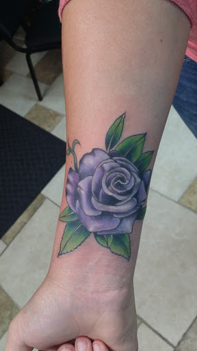 Explore july birth flower tattoo ideas, creative tattoo ideas in Ocala, available at The Tattoo Gallery of Ocala LLC