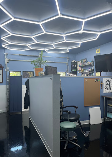 Explore inner bicep tattoo ideas for guys, creative tattoo ideas in Erie, available at Code of Honor Tattoo