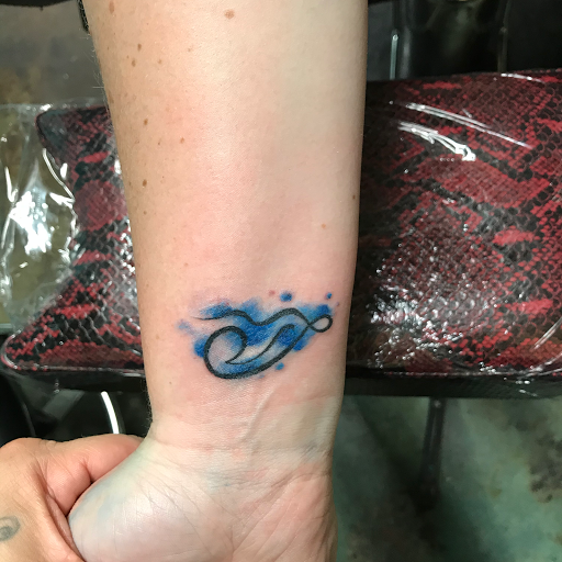 Explore tattoo ideas lettering, creative tattoo ideas in Las Vegas, available at Las Vegas Tattoo Collective, LLC