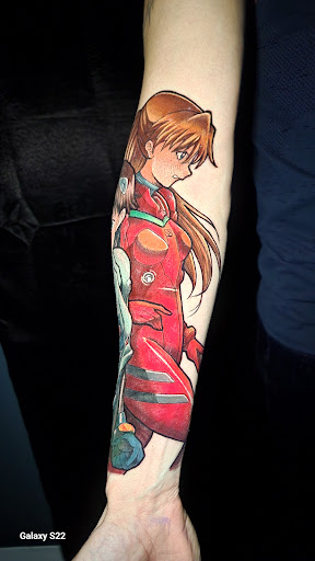 Explore female chest piece tattoo ideas, creative tattoo ideas in Buford, available at Inked Arts Tattoo Studio
