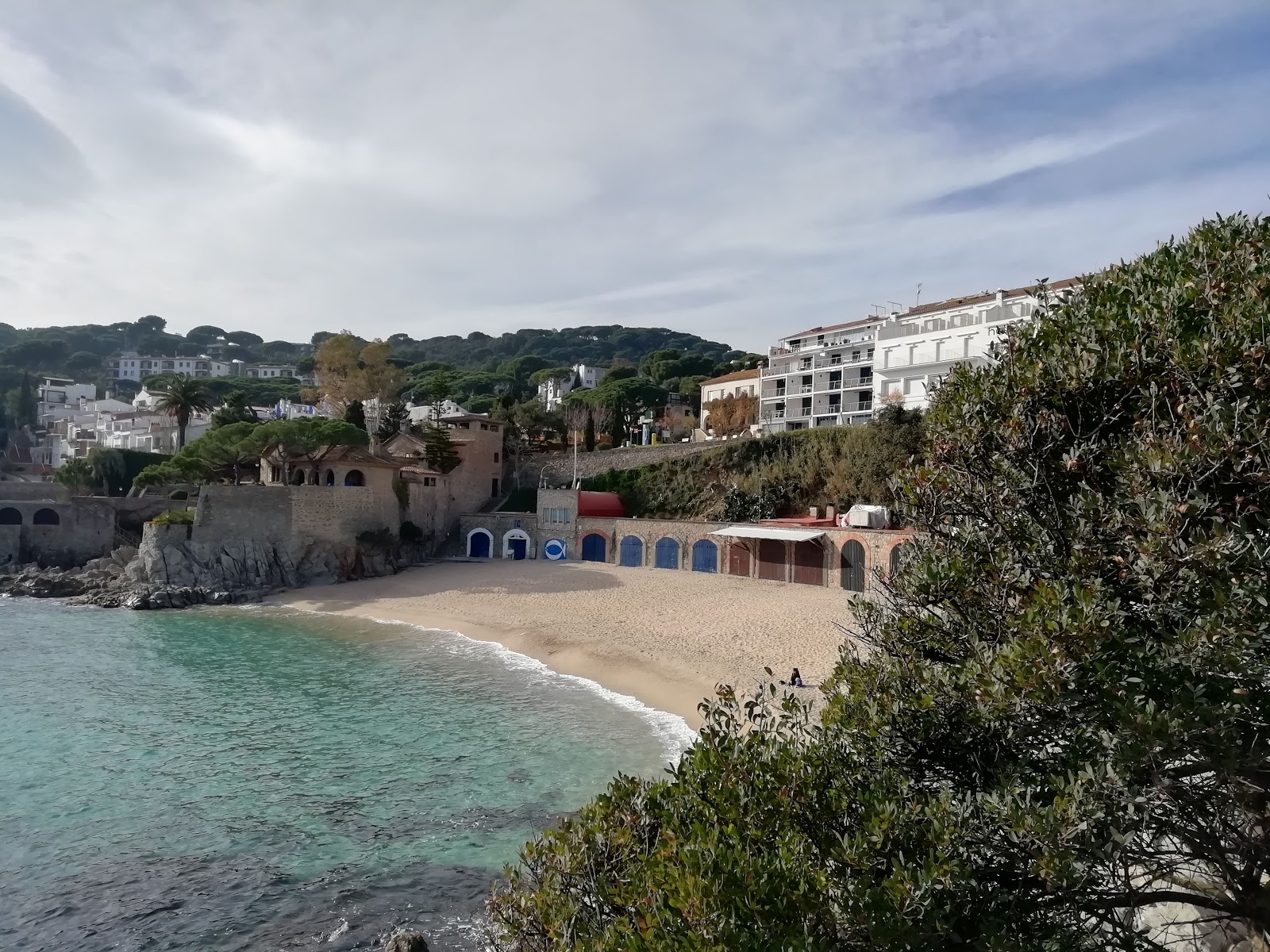 Foto van Platja Port Pelegri met helder zand oppervlakte