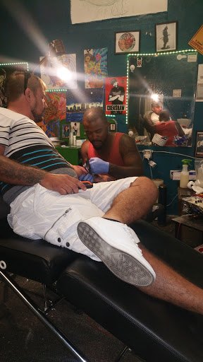 Explore atlas tattoo ideas, creative tattoo ideas in Jacksonville, available at Renegade Art Studio LLC