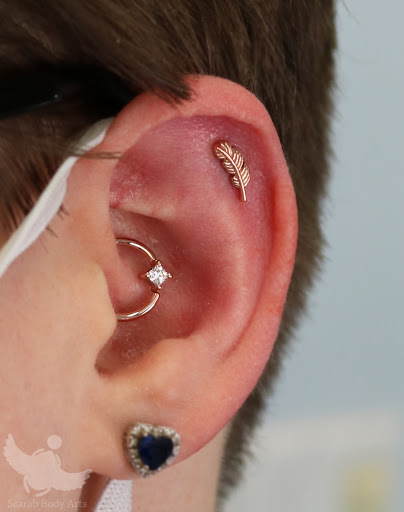 Explore viking head tattoo ideas, creative tattoo ideas in Syracuse, available at Scarab Body Arts