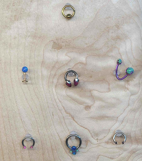 Explore family tattoo ideas for females, creative tattoo ideas in Romulus, available at Urban Rituals Piercing and Tattoo