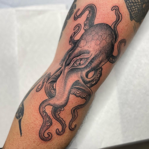 Explore haitian tattoo ideas, creative tattoo ideas in Charleston, available at The Edge Tattoo Studio