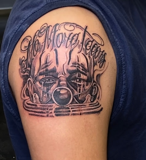 Explore simple tattoo ideas for beginners, creative tattoo ideas in Orange, available at Ink Activitiez Tattoo