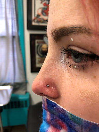 Explore clover tattoo ideas, creative tattoo ideas in West Chester, available at Piercing by Jacqueline at X-Treme Ink Tattoo