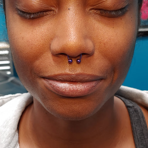 Explore tattooed wedding ring ideas, creative tattoo ideas in San Marcos, available at Ollie the Impaler Body Piercing