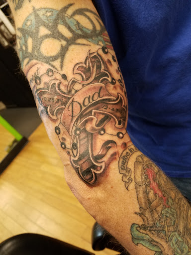 Explore dark romance tattoo ideas, creative tattoo ideas in Burlington, available at Mr Tattoos & Piercing