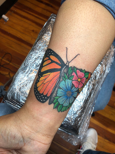 Explore cover up tattoo ideas for men, creative tattoo ideas in Towson, available at Rose & Dagger Art Studio