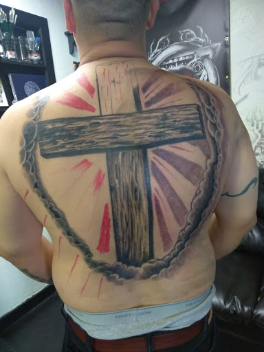 Explore mens angel tattoo ideas, creative tattoo ideas in Modesto, available at Ink Disciples Tattoo Parlor