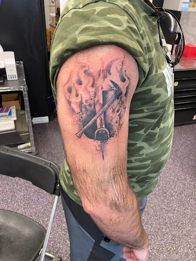 Find small tree tattoo ideas for your next unique tattoo in Sarasota at Z-Edge Tattoo and Body Piercing North Shop